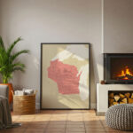 A large Wisconsin map print positioned near a glowing fireplace, adding a welcoming touch to a warm and relaxed living room scene.
